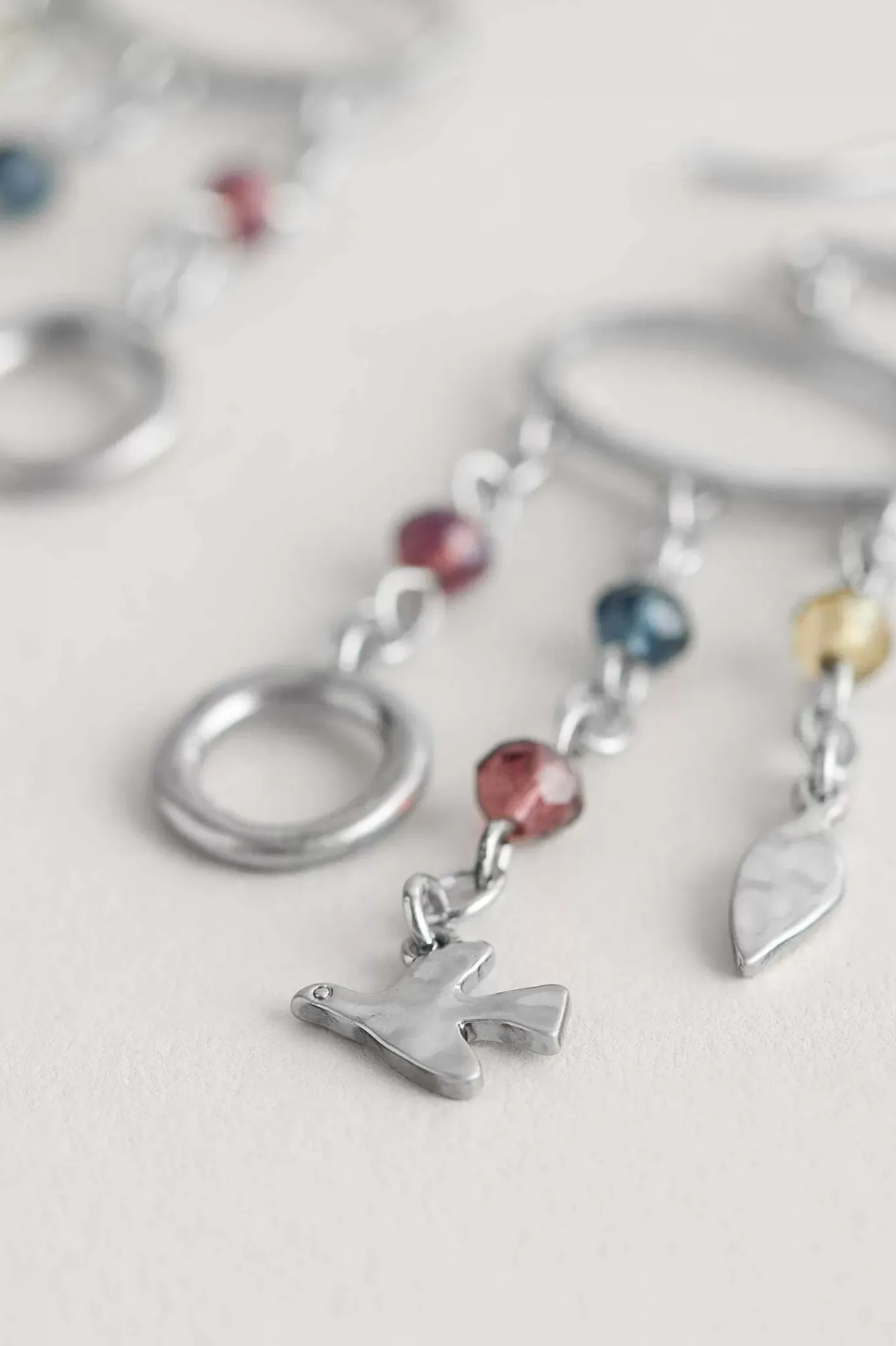 Chy Silver Tone Charm Earrings
